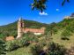 Chambres d'h&ocirc;tes &agrave; Pila Canale, le grand Valinco, en Corse du Sud, labellis&eacute; G&icirc;tes de France : vue du jardin sur le clocher 