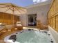 Chambres d'h&ocirc;tes &agrave; Sarrola Carcopino, Le Grand Ajaccio, Corse du Sud, labellis&eacute; G&icirc;tes de France : la terrasse privative avec jacuzzi de la chambre4