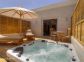 Chambres d'h&ocirc;tes &agrave; Sarrola Carcopino, Le Grand Ajaccio, Corse du Sud, labellis&eacute; G&icirc;tes de France : la terrasse privative avec jacuzzi de la chambre5